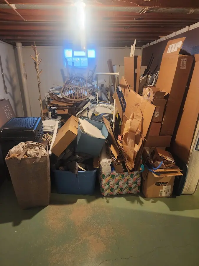 Roll-off dumpster container at job site for 4 Yard Dumpster Rental in Port St. Lucie